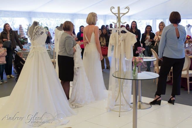 Bride model and wedding dresses on mannequin