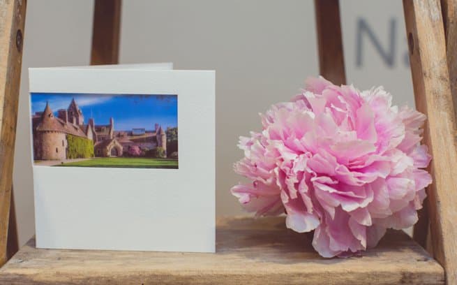 Photo of St Ouens Manor printed on a white invitation | Kelly Chandler Consulting