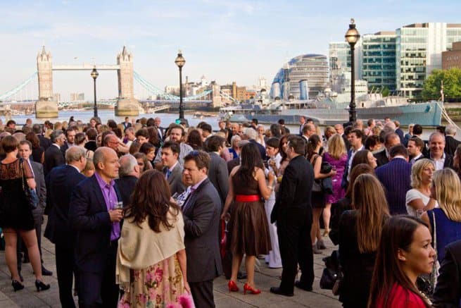 External party overlooking tower bridge | Kelly Chandler Consulting