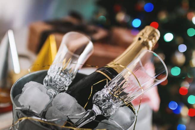 Champagne and glasses in an ice bucket | Kelly Chandler Consulting