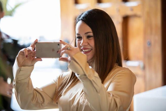 Waddesdon Manor Wedding Venue Showcase Lady Taking Iphone picture | Kelly Chandler Consulting