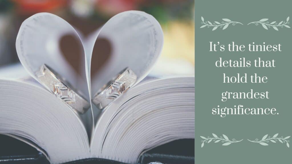 Wedding rings on a book with the pages folded to make a heart around the rings. The accompanying quote reads "Its the tiniest details that hold the grandest significance" 