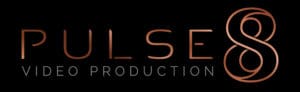 Kelly Chandler, professional video producer, in a studio setting for Pulse 8 Video Production.